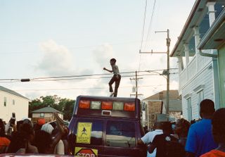 Central City 2018 by Akasha Rabut - kid dancing on roof of van