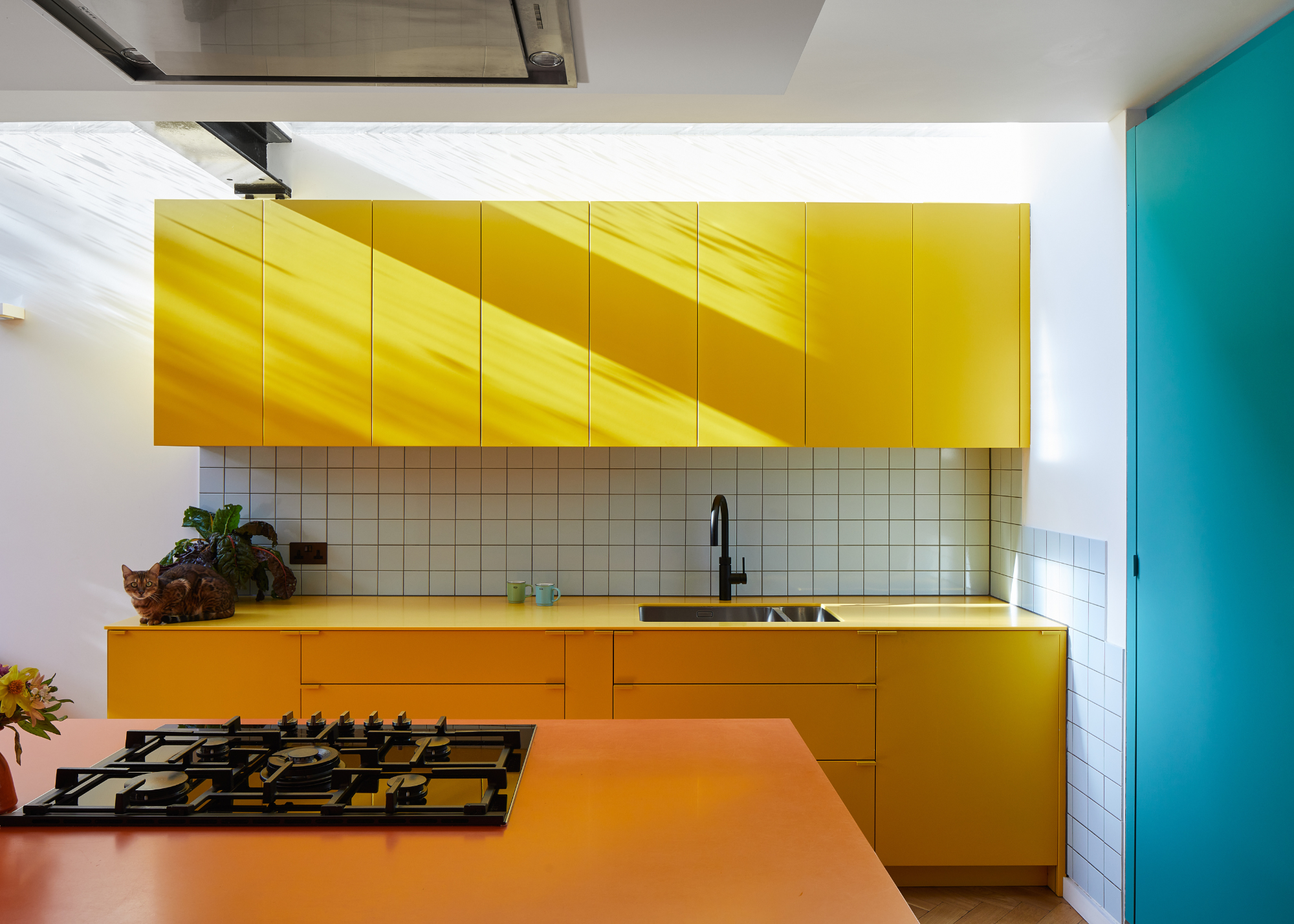 color blocked modern himac kitchen in yellow blue and orange