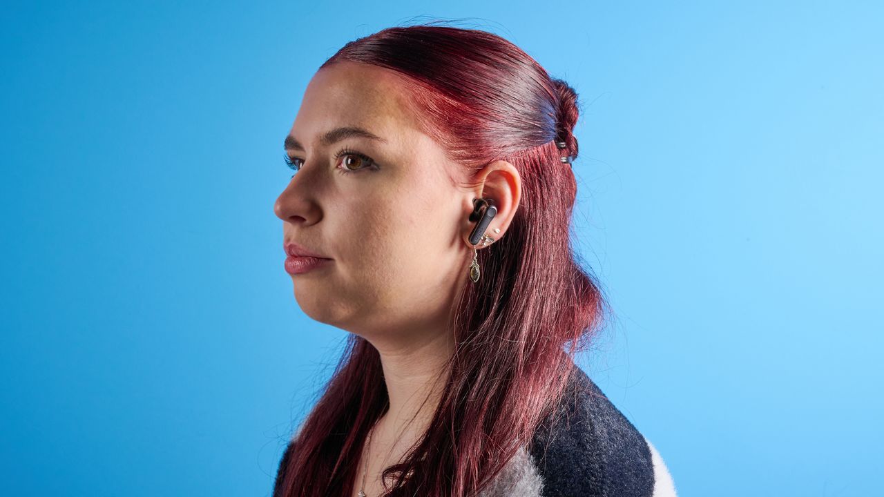 the earfun air pro 4+ earbuds in black showing the ear tips, charging case, and being worn