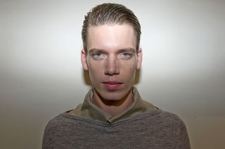 male model with slicked back styled hair