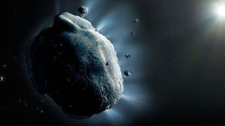 A large rock in space surrounded by smaller rocks