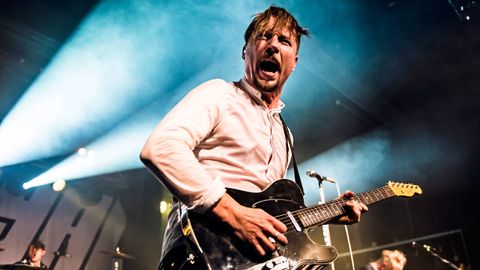Guitar face: Hannes Irengård playing live