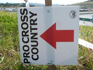 Follow these arrows to check out the pro cross country course.