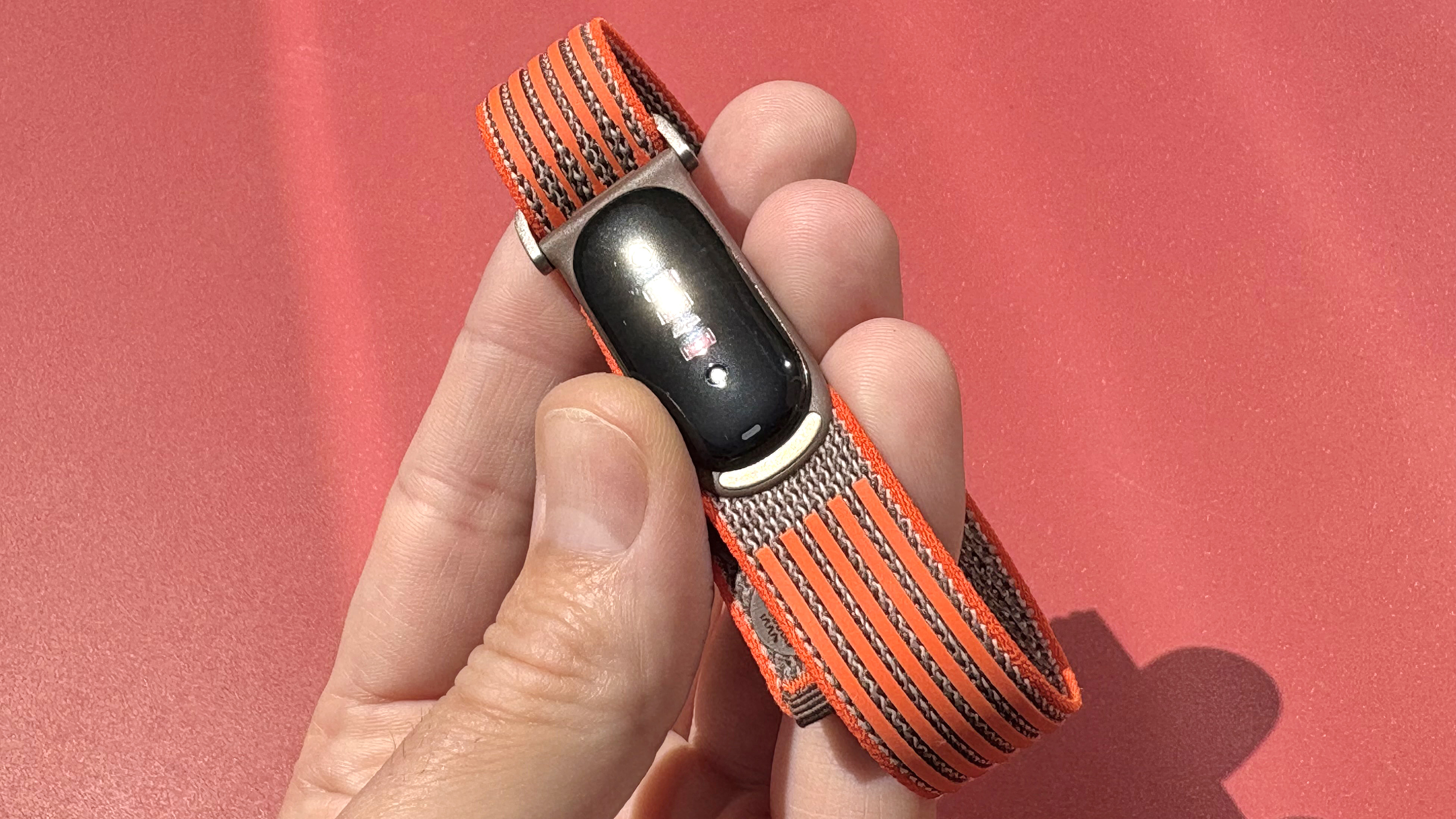 Hands-on with the Fitbit Air on the orange and brown Stephen Curry strap
