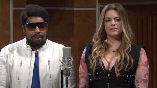 Kenan Thompson and Cecily Strong dressed up as the Black Eyed Peas during a recording session.