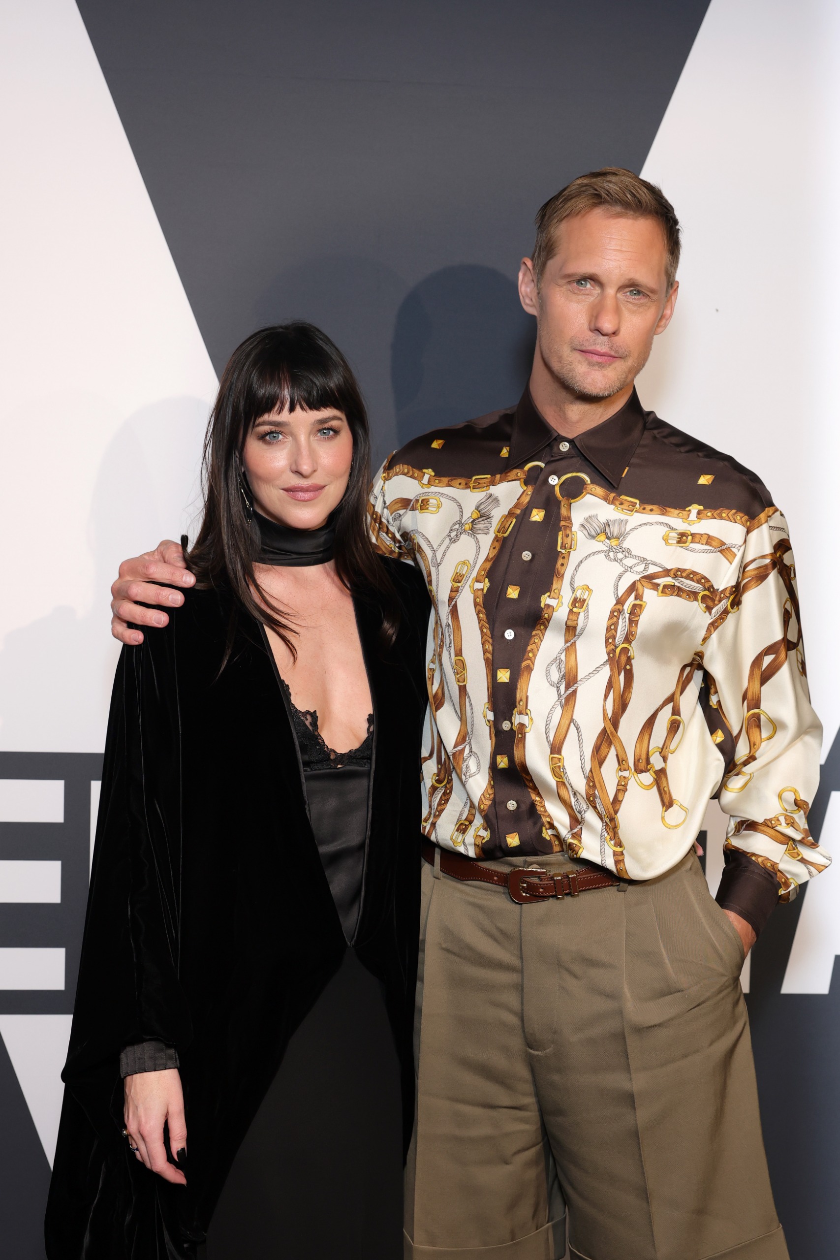Photo of Dakota Johnson and Alexander Skarsg&amp;aring;rd at Valentino Beauty's Vendetta Event
