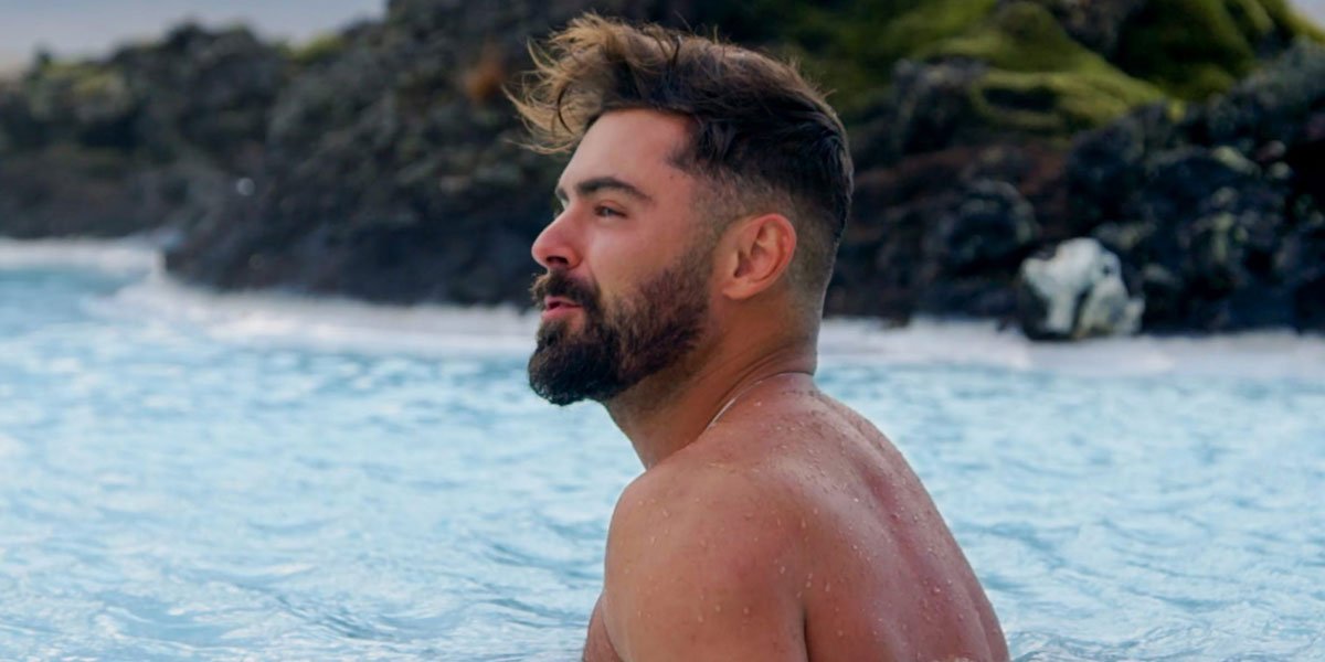 Zac Efron at the beach in Netflix&#039;s Down To Earth 2020