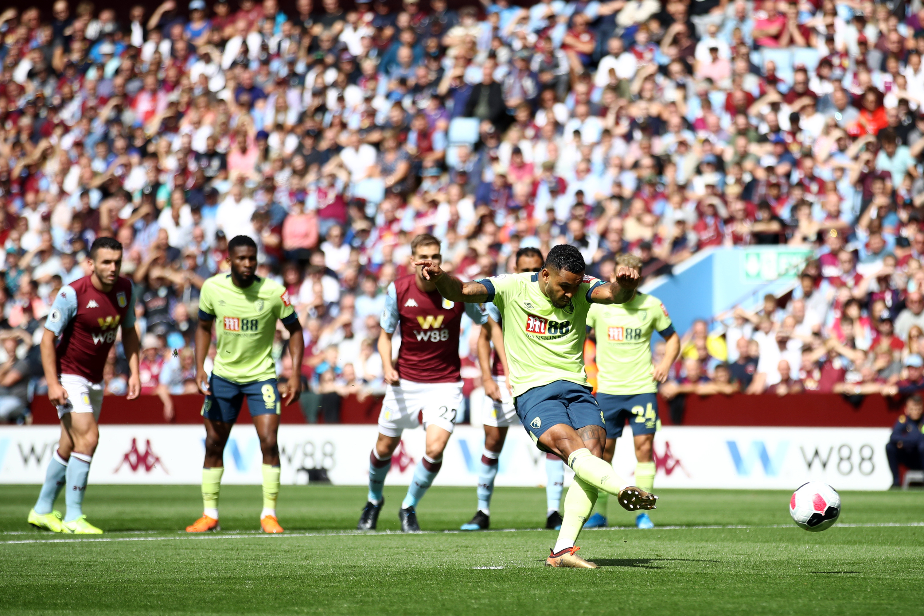 Joshua King opens the scoring at Villa Park