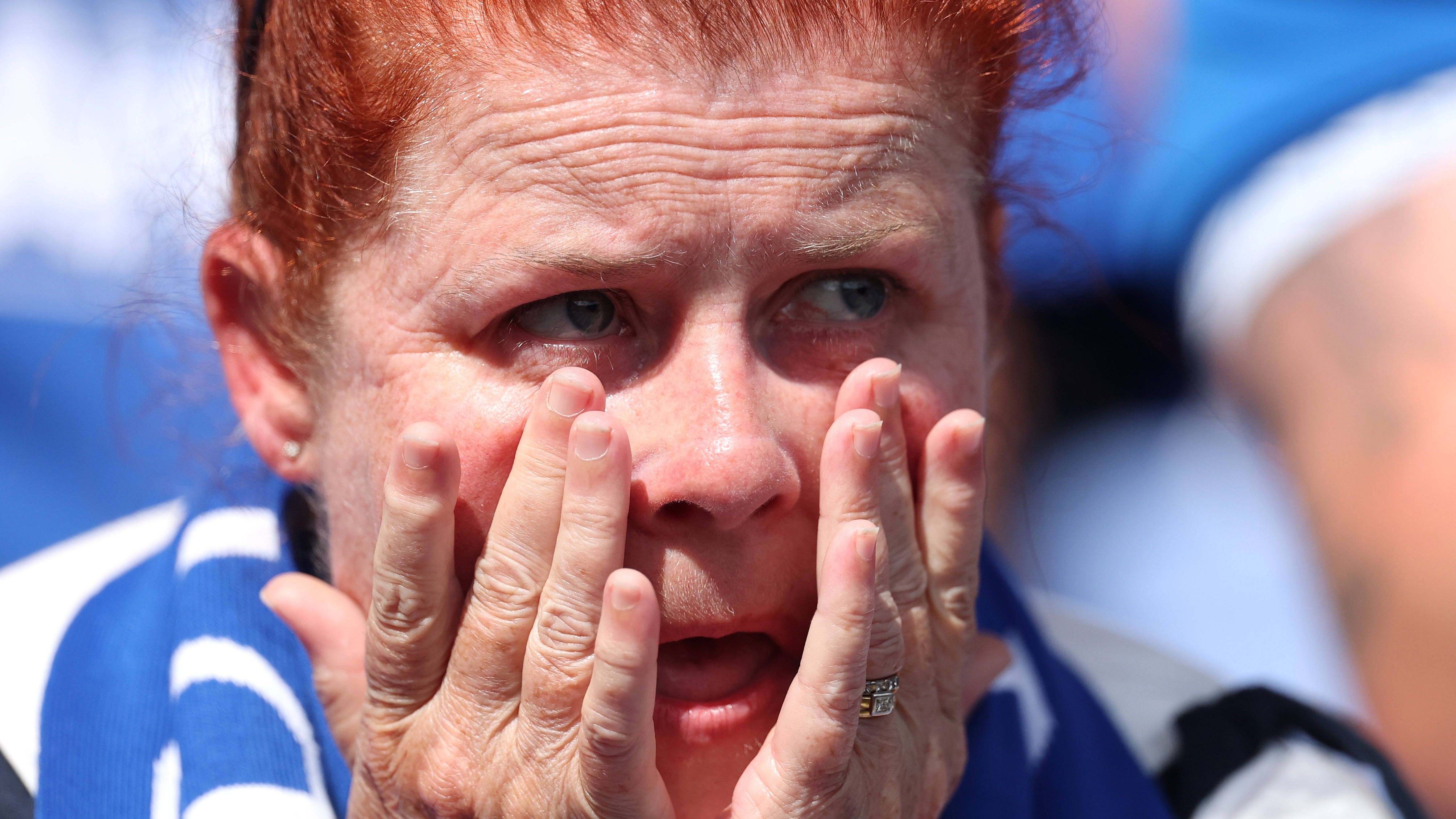 LIVERPOOL, ENGLAND - A fan of Everton appears emotional inside the stadium following their team's victory in the Premier League match between Everton FC and Southampton ahead of the Premier League 2025/26 season.