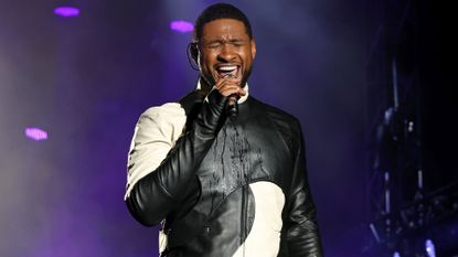 Usher performing at an event