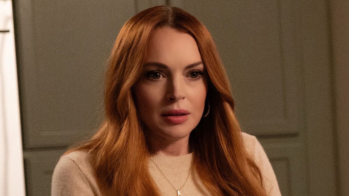 Photo of Lindsay Lohan in red Christmas lipstick for Netflix&#039;s Our Little Secret.