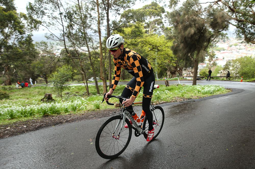 A rider navigates the wet roads at the Tour of Tasmania prologue