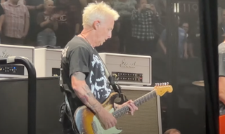 Mike McCready onstage with Pearl Jam in 2023