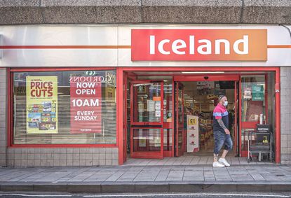 Customer leaving an Iceland store