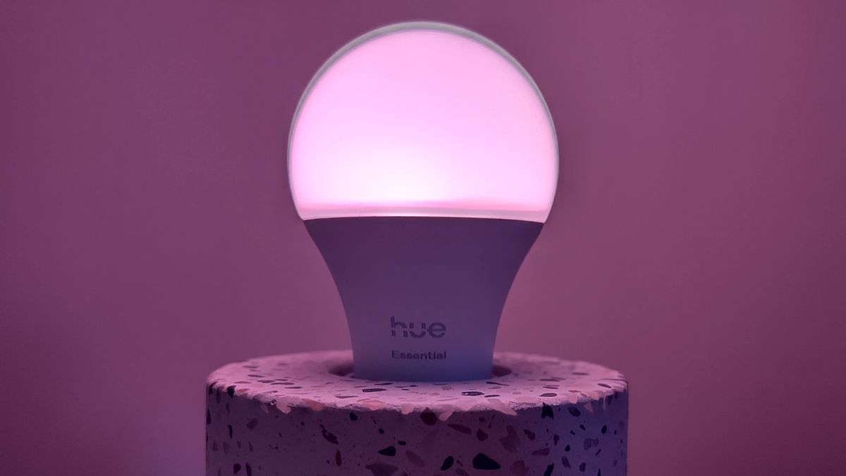 Philips Hue Essential bulb set to purple showing dark 'halo' around the top