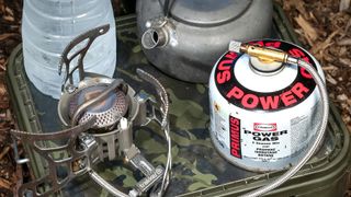 Gas canisters with a camping stove