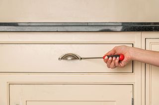 removing handles when painting kitchen cabinets