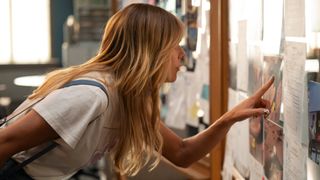 Morgan looks at a case board in High Potential