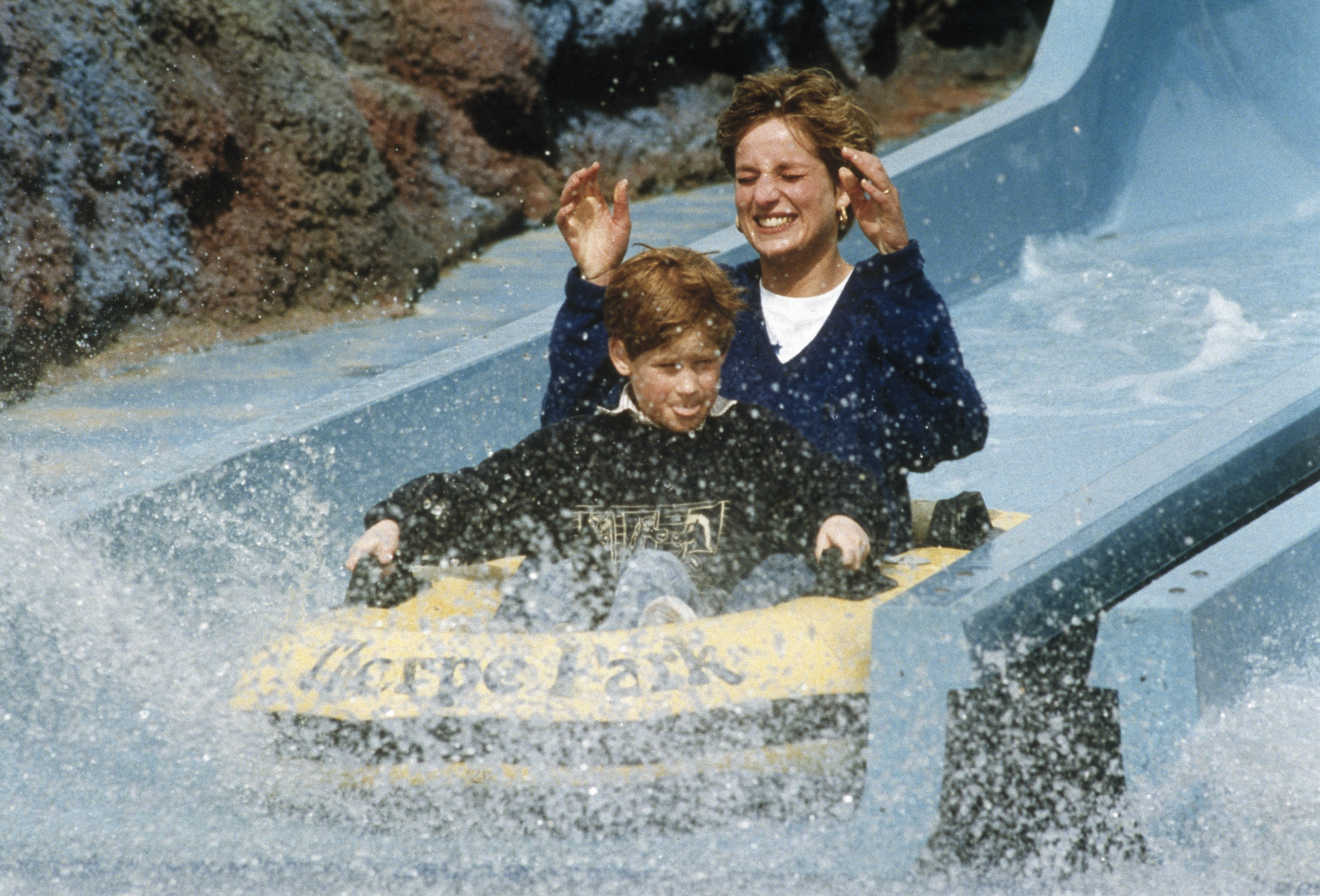 Princess Diana and Prince Harry ride a log flume on April 18, 1992 at Thorpe Park in the UK