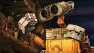 Wall-e looking at cube