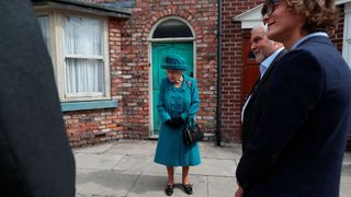 The Queen visits Coronation Street.