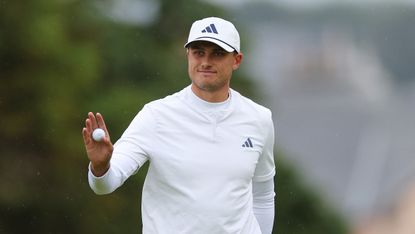 Ludvig Aberg waves to the crowd during round three of the 2024 Scottish Open