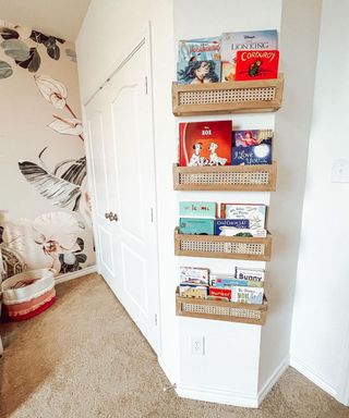 A children's bedroom with DIY bookshelf made from trim and cane