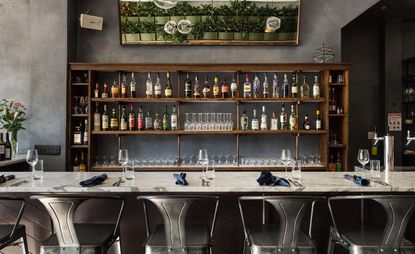 Bar with countertop and chairs