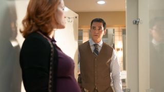 Ramon Rodriguez looking at Erika Christensen in Will Trent Season 4.