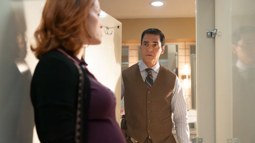 Ramon Rodriguez looking at Erika Christensen in Will Trent Season 4.