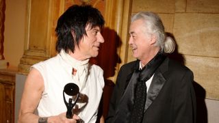 Jeff Beck and Jimmy Page pose attends the 24th Annual Rock and Roll Hall of Fame Induction Ceremony at Public Hall on April 4, 2009 in Cleveland, Ohio.