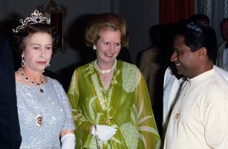 The Queen and Thatcher attending a ball in Zambia