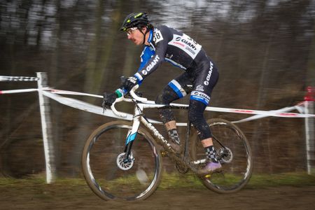 Adam Craig (Giant) descends the muddy slopes of Mt. Krumpit