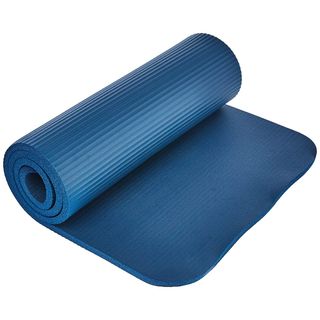 Rolled up mat, which is a rich, dark blue and thick, on white background