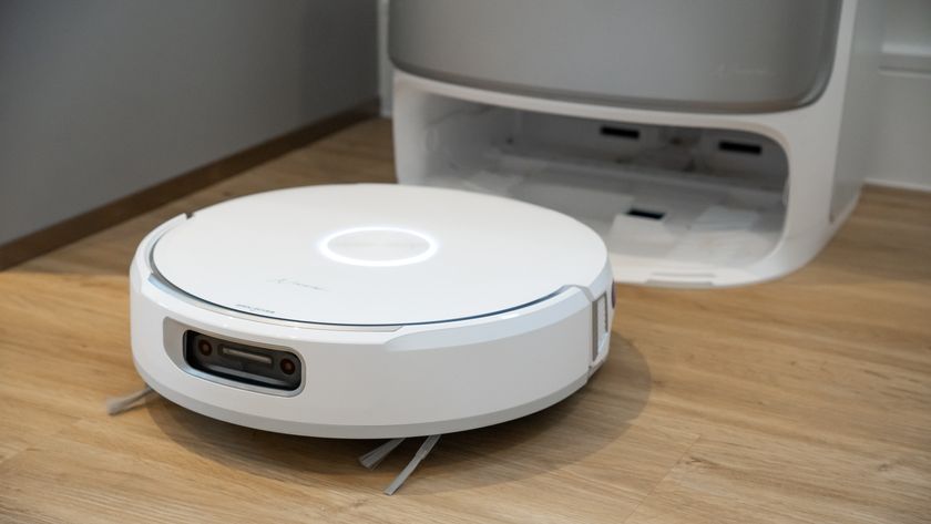 Narwal Flow robot vacuum next to its base