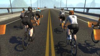 A view of multiple Zwift riders in-game from behind