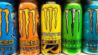 Monster Energy drink cans side-by-side.