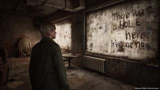 The interior of Neely's bar. Graffiti on the papered-over windows reads "There was a hole here. It's gone now."