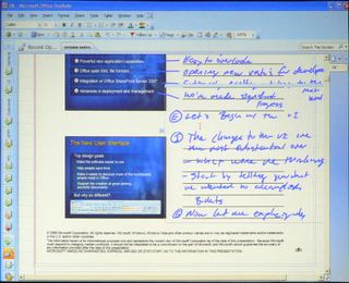 This year, OneNote - which appears in Office Professional - adds the ability to share notebooks. Here, OneNote has captured the slides from one of Alexieff's presentations, letting him add handwritten notes in the margins on his tablet PC.