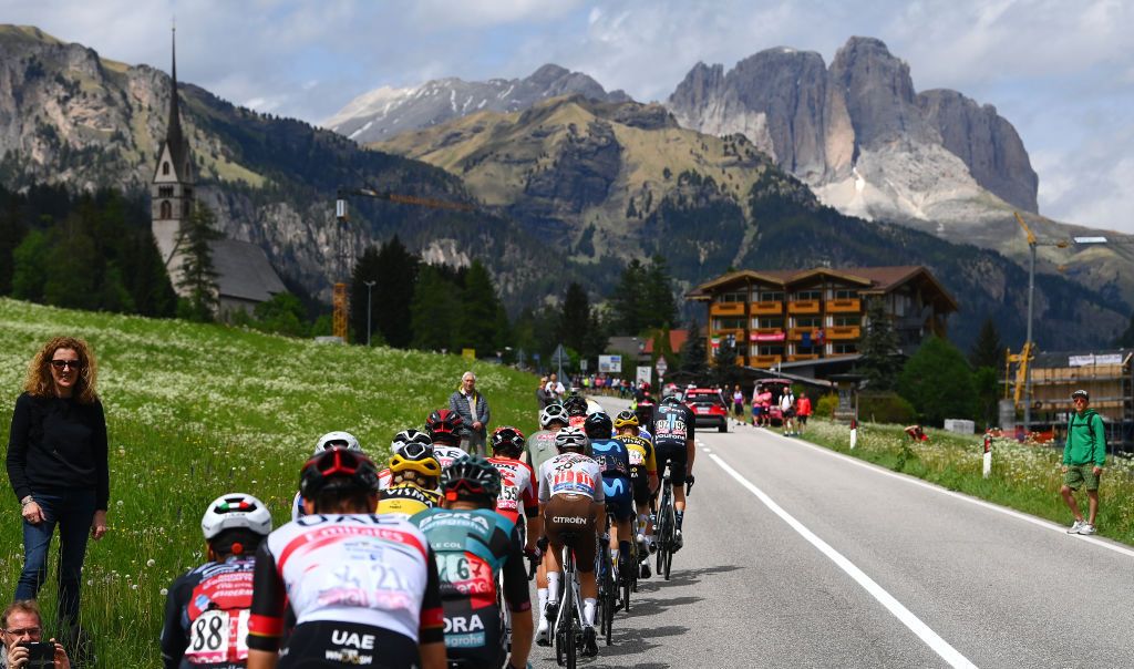PASSO FEDAIA, ITALY - MAY 28: Sylvain Moniquet of Belgium and Team Lotto Soudal, Andrea Vendrame of Italy and AG2R Citroen Team and a general view of the breakaway passing through Vigo di Fassa (1304m) while fans cheer during the 105th Giro d'Italia 2022, Stage 20 a 168km stage from Belluno to Marmolada - Passo Fedaia 2052m / #Giro / #WorldTour / on May 28, 2022 in Passo Fedaia, Italy. (Photo by Tim de Waele/Getty Images)