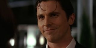 Christian Bale gives a smile as Bruce Wayne in Batman Begins