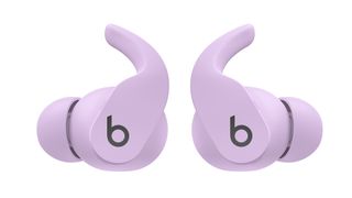 A pair of Beats Fit Pro earbuds in purple finish