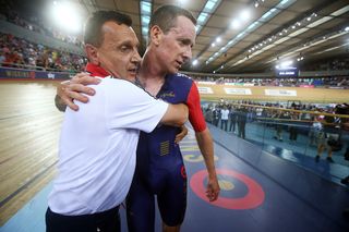 Bradley Wiggins of Great Britain and Team Wiggins is congratulated by coach Heiko Salzwedel after breaking the UCI One Hour Record at Lee Valley Velopark Velodrome.