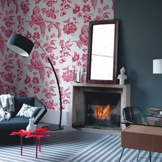 living room with floral printed wallpaper