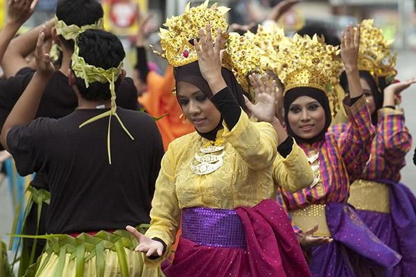 Malaysian performers at the finish to stage seven in Tampin.