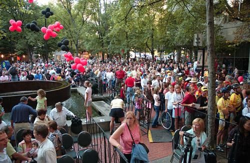 The crowd waits for George's autograph
