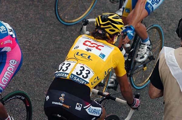 Fabian Cancellara (Team CSC) heads the other way to receive another yellow jersey.