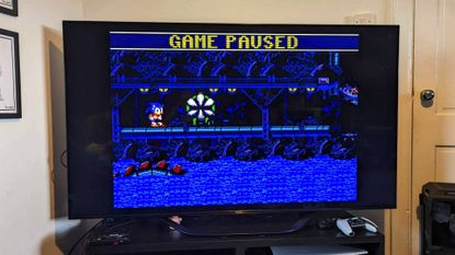 Cyber Monday gaming Tv deals featured image with Hisense U7K and Sonic Spinball on screen