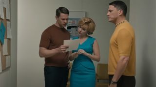 Channing Tatum stares at a bulletin board as Scarlett Johansson runs lines with his look-alike.