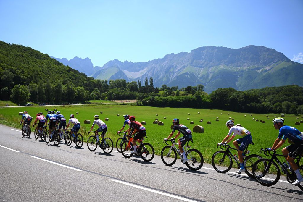 BARCELONNETTE FRANCE JULY 18 LR Ben Healy of Ireland and Team EF Education EasyPost Gregor Muhlberger of Austria and Movistar Team Quentin Pacher of France and Team Groupama FDJ Mathieu Burgaudeau of France and Team TotalEnergies Louis Meintjes of South Africa and Team Intermarche Wanty Neilson Powless of of The United States Sean Quinn of The United States and Team EF Education EasyPost Michal Kwiatkowski of Poland and Team INEOS Grenadiers and a general view of the breakaway competing during the 111th Tour de France 2024 Stage 18 a 1795km stage from Gap to Barcelonnette 1134m UCIWT on July 18 2024 in Barcelonnette France Photo by Dario BelingheriGetty Images